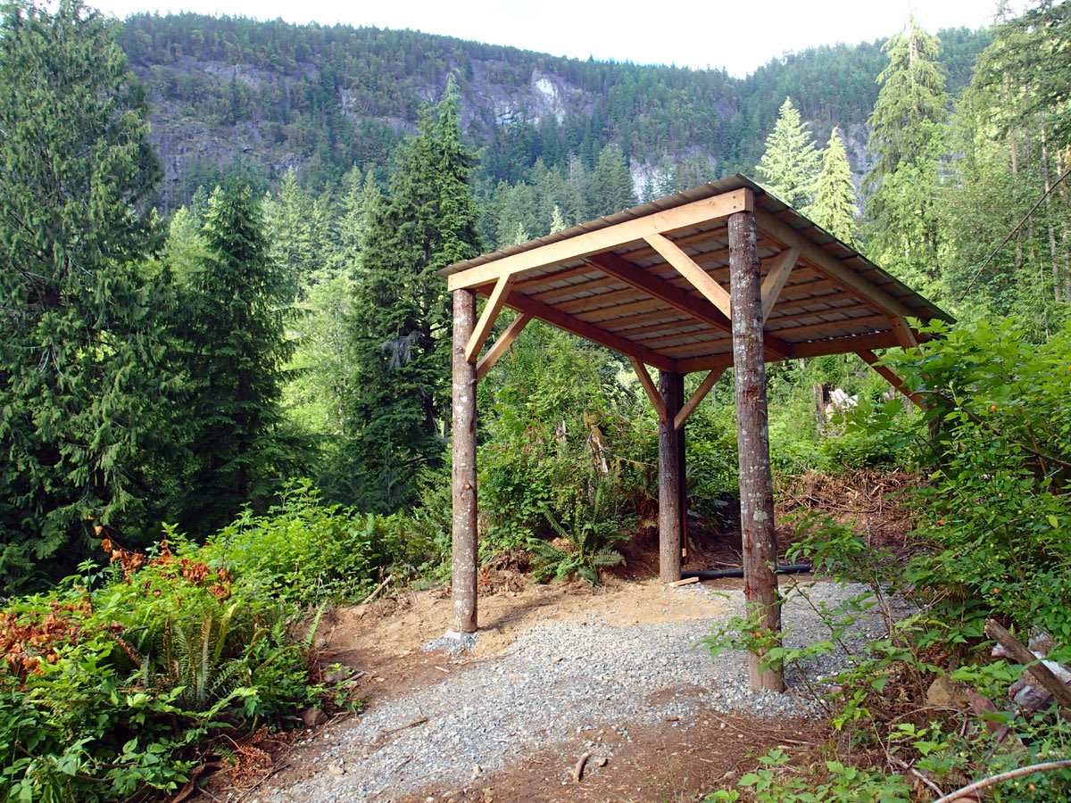 10x10 local wood shelter for table or tent. Enjoy your camping experience rainor shine