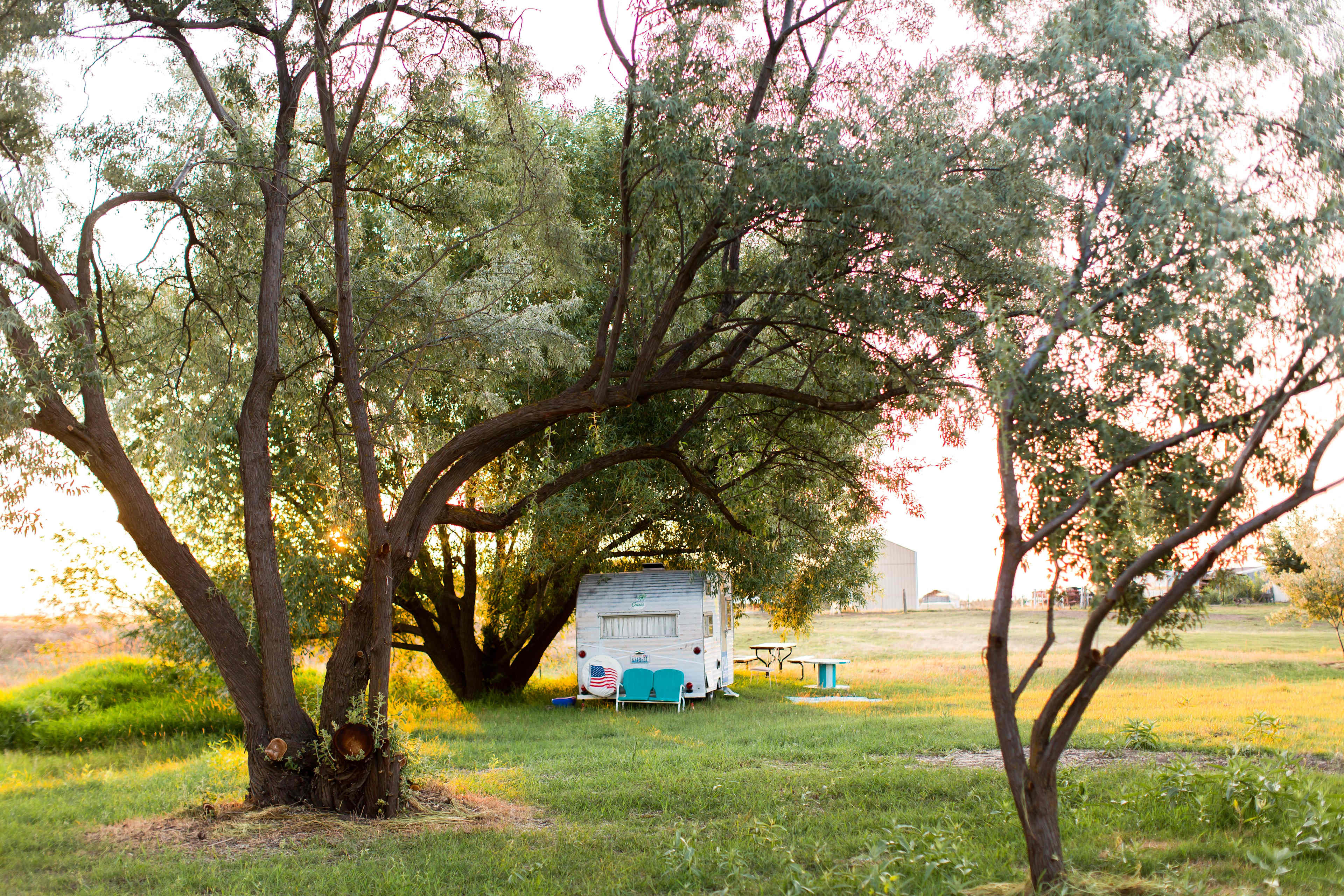 Adorable vintage camper on the property